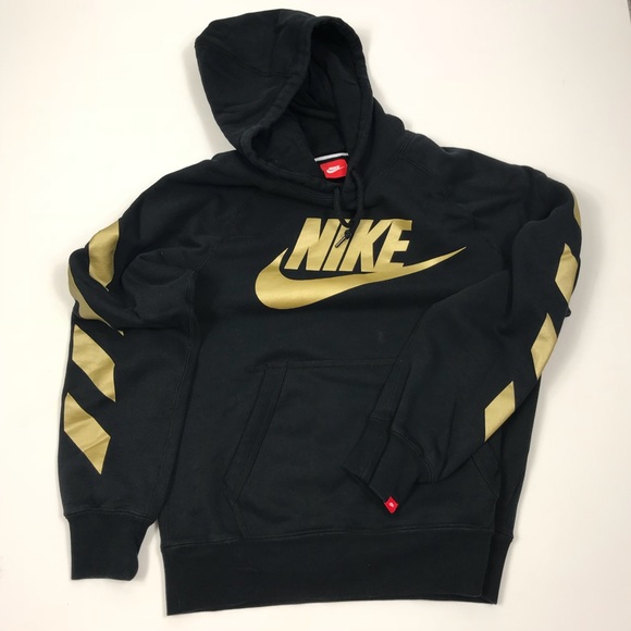 gold and black nike sweater